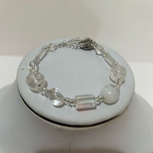Clear beaded handmade bracelet with button-style closure 8”